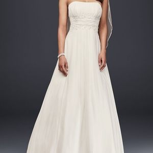 Beautiful Strapless Ivory Wedding Gown. From David